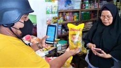 QRIS di Pasar Mbongawani, Belanja Rp 50 ribu Gratis 1 Liter Minyak Goreng